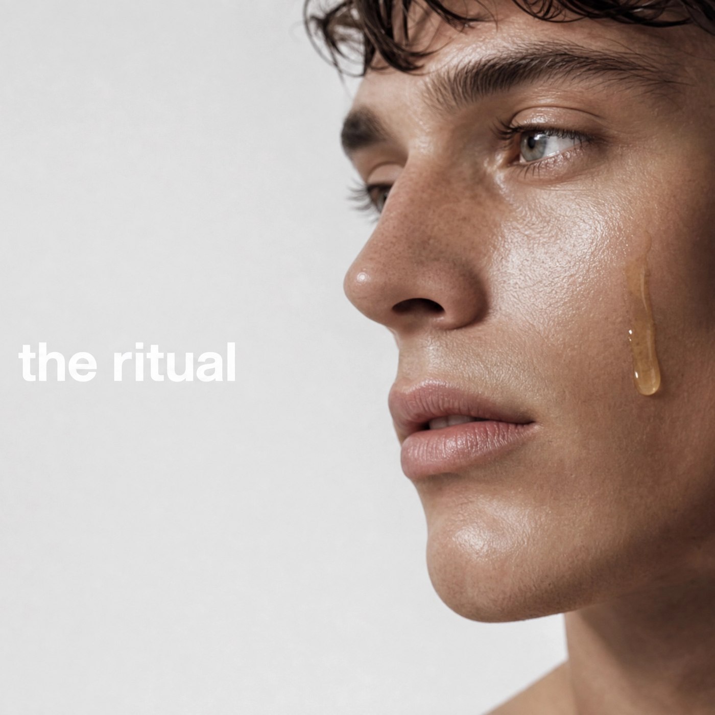 Two people with a product applied to their skin, with 'the ritual' branding.